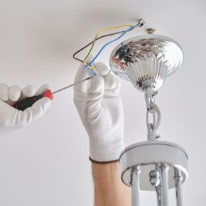 Ribble Valley handyman installing new light switches, sockets, and smoke alarms in a Clitheroe home